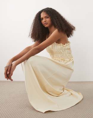 Gesmoktes Midi-Sommerkleid in Buttermilchgelb mit schmalen Trägern Gelb L