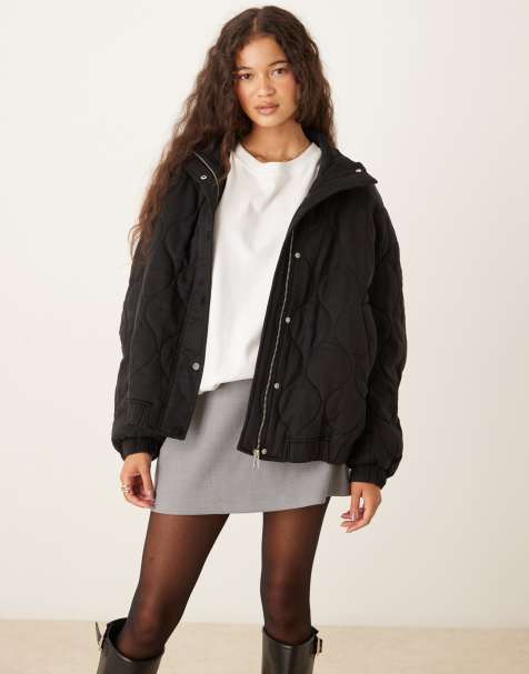ASOS DESIGN – Gesteppte Bomberjacke in Schwarz mit Passe - view 1