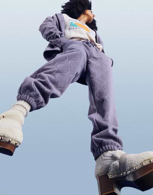 ASOS DESIGN – Gesteppte Fleece-Jogginghose in staubigem Lila, Kombiteil