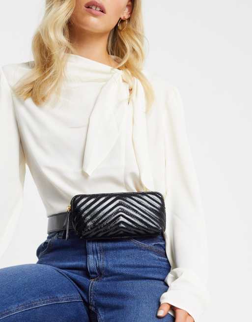 ASOS DESIGN – Gesteppte Gürteltasche in Schwarz