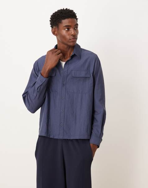 ASOS DESIGN - Gestreept overhemd van katoen met ruimvallende pasvorm en zakdetail in marineblauw - view 1