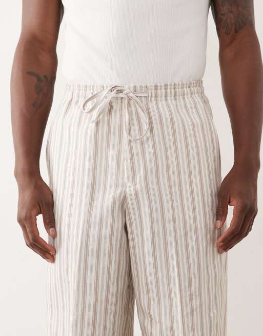 ASOS DESIGN - Gestreepte pantalon van linnenmix met wijde pijpen en elastische taille in crème, 4 van 5