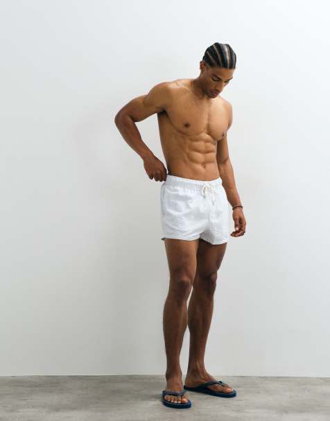 ASOS DESIGN - Gestreepte, super korte zwemshort van seersuckerstof in blauw - view 1