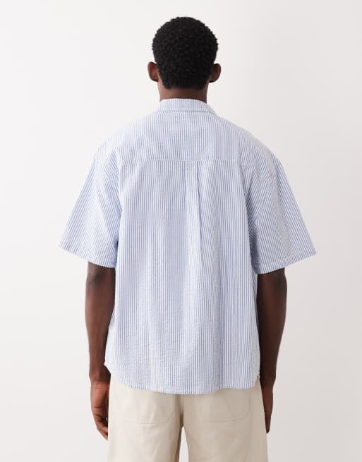 ASOS DESIGN – Gestreiftes Oversize-Hemd in Blau mit Aufnäher, 4 von 5