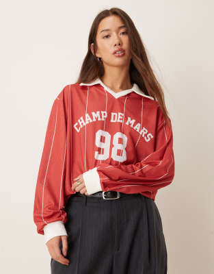 ASOS DESIGN - Gestreiftes Oversize-Rugbyshirt aus Airtex in Rot mit „Paris"-Print