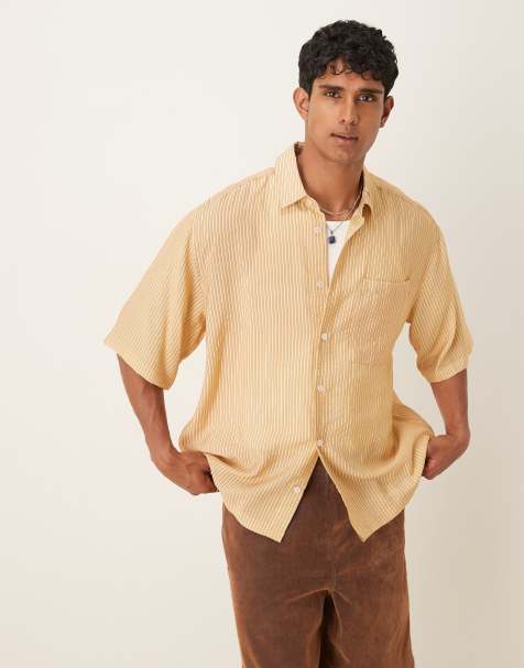 ASOS DESIGN – Gestreiftes Oversize-T-Shirt in Gelb - view 1