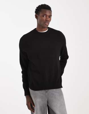 Gestrickter Oversize-Pullover aus Lammwolle in Schwarz mit Rundhalsausschnitt Schwarz 2XL