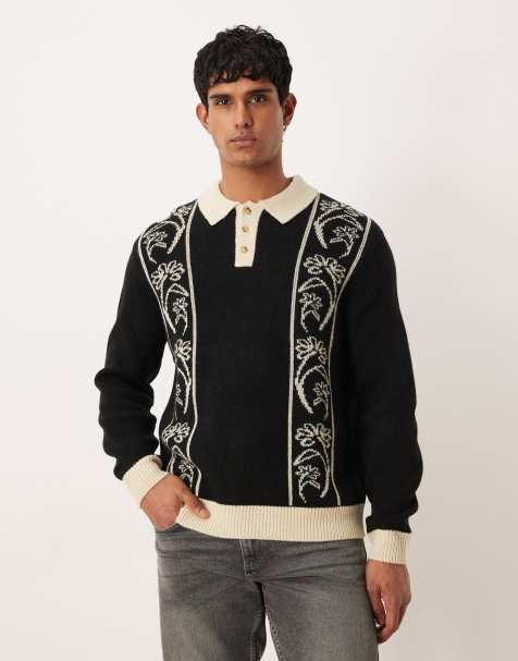 ASOS DESIGN – Gestricktes Relaxed Fit Polohemd in Schwarz mit Blumenmuster - view 1