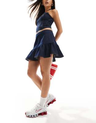 ASOS DESIGN – Gestufter Minirock aus Denim in dunklem Indigoblau - view 1