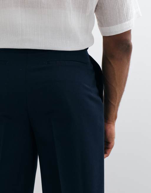 ASOS DESIGN getailleerde broek met dubbele plooien en wijde pijpen in navy, 4 van 5