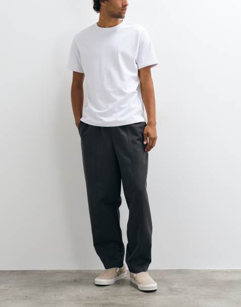 ASOS DESIGN - Getailleerde elastische oversized toelopende broek in antracietgrijs - view 1