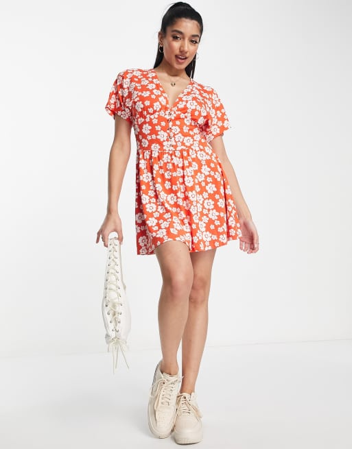 ASOS DESIGN - Getailleerde nette mini jurk met knopen in rode bloemenprint