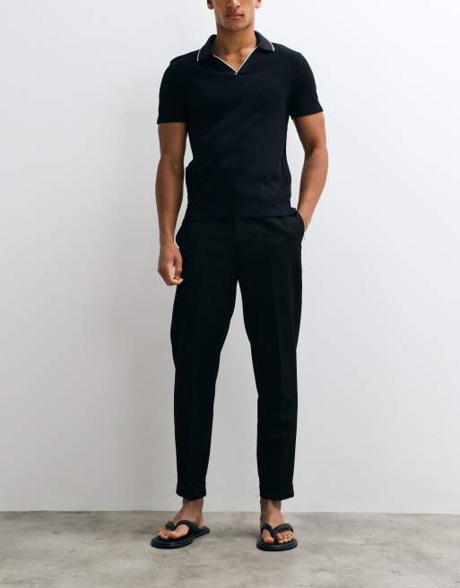 ASOS DESIGN getailleerde toelopende broek in zwart met elastische taille en omslag, 2 van 5