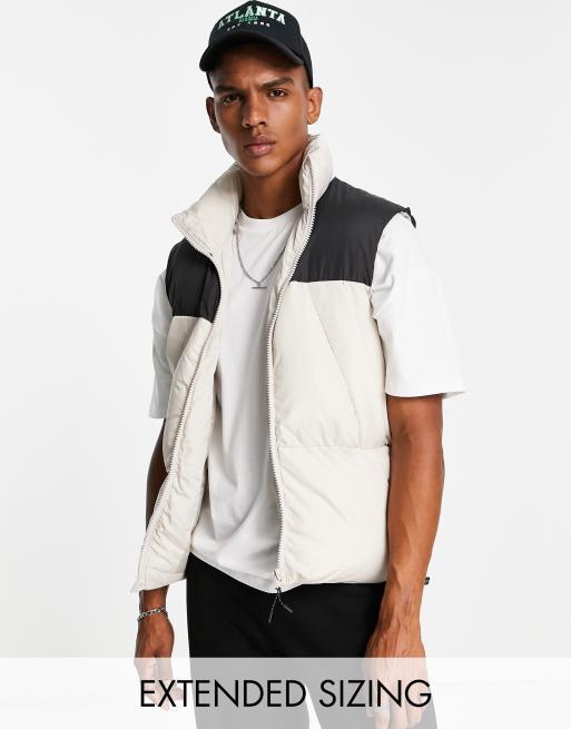 ASOS DESIGN - Gewatteerd gilet in kiezelkleur met contrasterende zwarte schouderpas