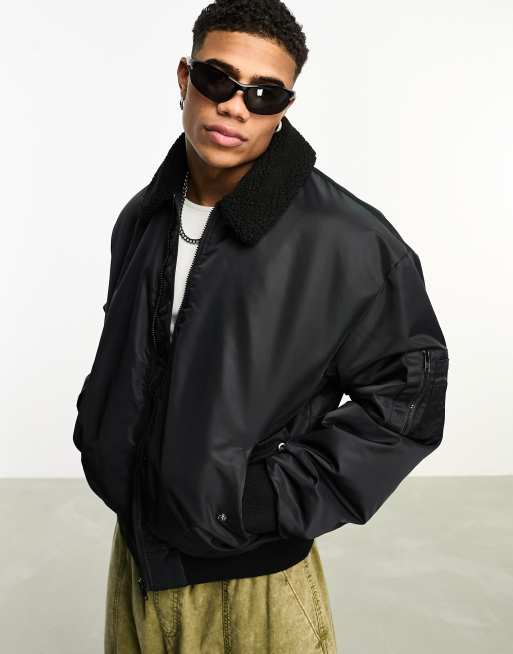ASOS DESIGN - Giacca bomber oversize nera con colletto in pile borg