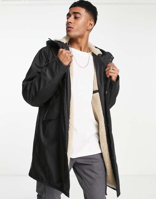 ASOS DESIGN - Giacca da pioggia nera con fodera in pile borg