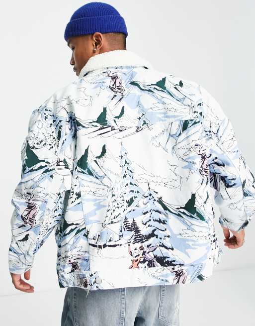 ASOS DESIGN - Giacca di jeans oversize con colletto in pile borg e stampa sci 