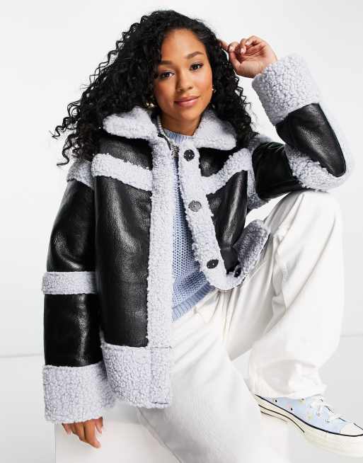 ASOS DESIGN - Giacca nera e blu con pannelli in pile borg