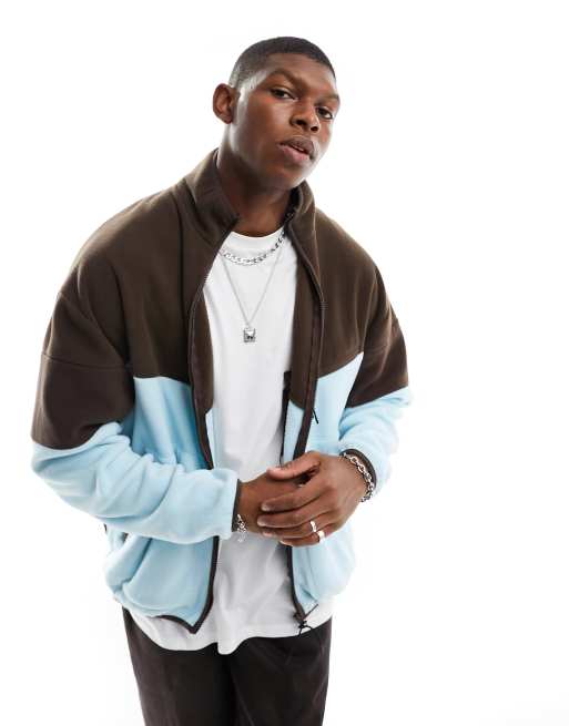 ASOS DESIGN - Giacca sportiva oversize con cerniera lampo in pile color block blu e marrone