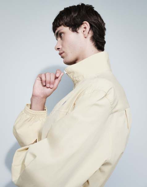 ASOS DESIGN giacca squadrata oversize con chiusura con zip e collo alto con ricamo sul petto gialla - view 1