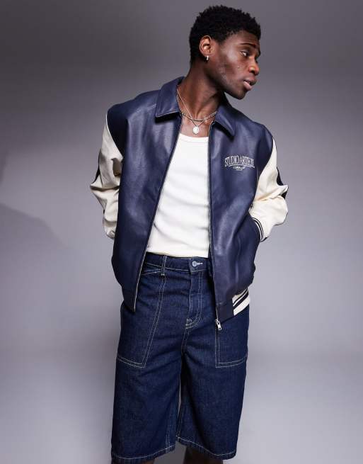 ASOS DESIGN - Giacca stile motocross oversize in pelle sintetica color blu navy con maniche a contrasto