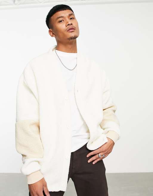 ASOS DESIGN - Gilet oversize imitation peau de mouton avec manches color block - Blanc cassé