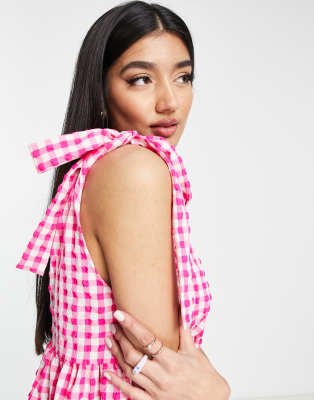 ASOS DESIGN gingham tie shoulder smock playsuit in pink gingham