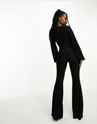 ASOS DESIGN glam plunge tie front jumpsuit in slinky in black