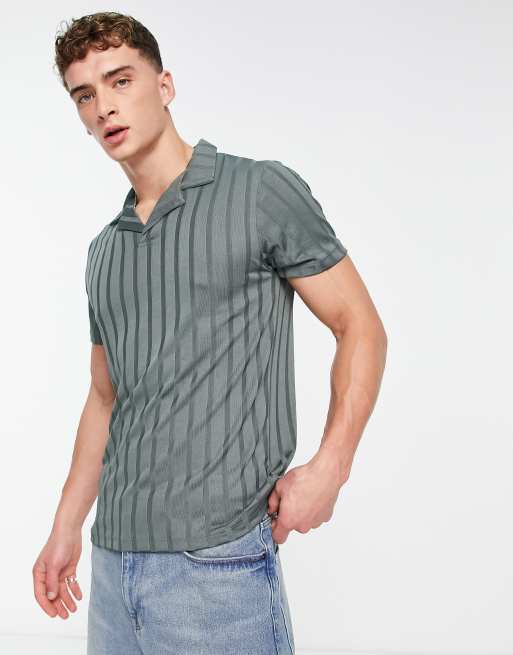ASOS DESIGN – Glänzendes, geripptes Polohemd in Dunkelgrün