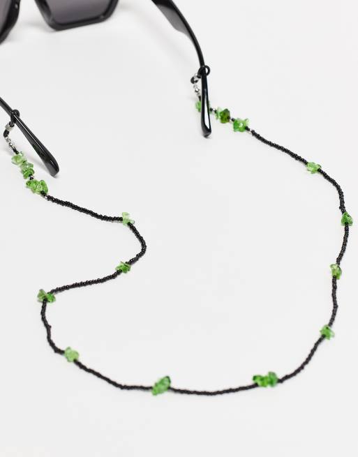 ASOS DESIGN glasses chain with green stones in black