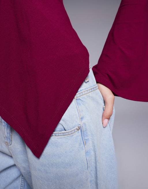 ASOS DESIGN godet insert long sleeve top with fluted sleeves in plum
