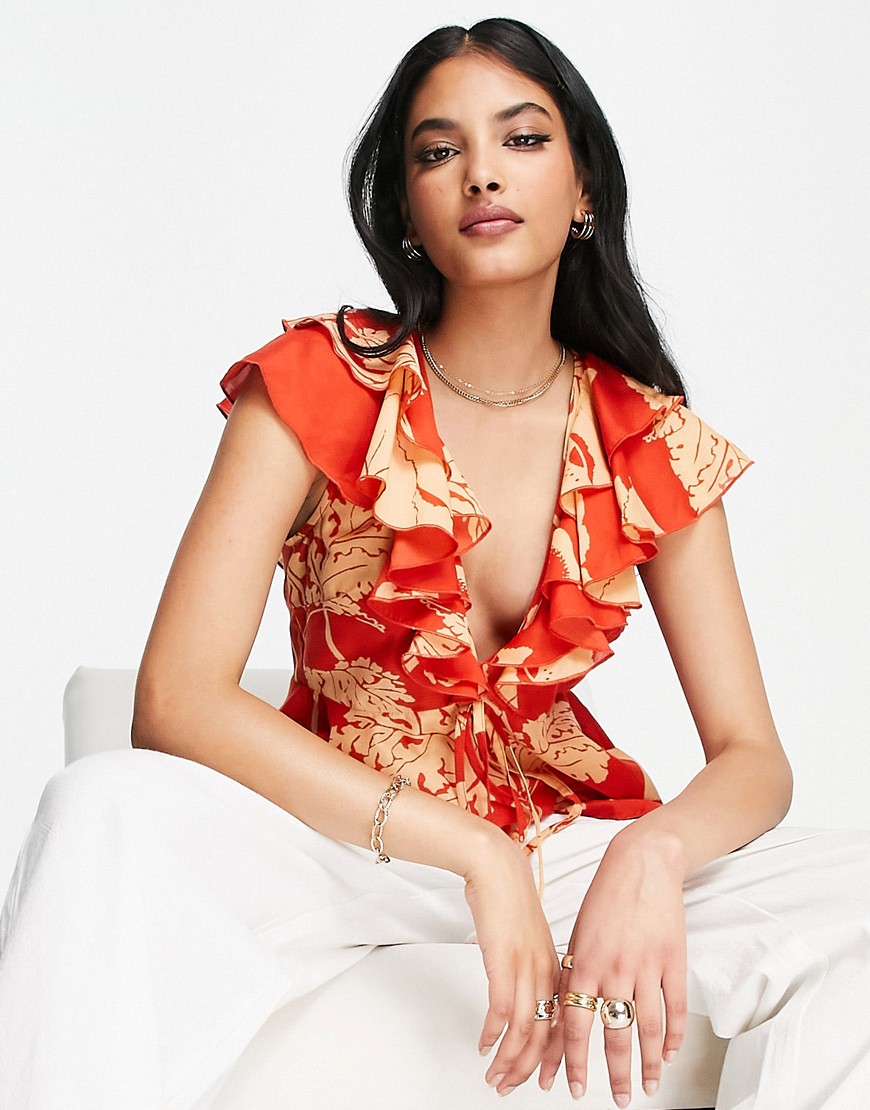 ASOS DESIGN Going Out frill sleeve plunge front blouse with cut out side in orange floral-Multi
