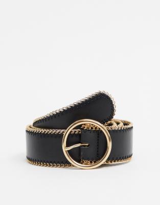 black belt with gold circle buckle