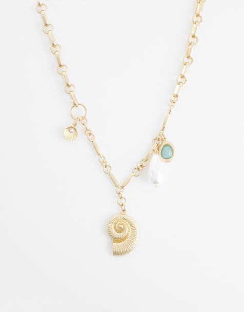 ASOS DESIGN – Goldfarbene, asymmetrische Halskette mit maritimen Anhängern - view 1