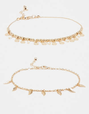 ASOS DESIGN - Goldfarbene Fußkettchen mit Strassanhängern im Blattdesign, 2er-Pack