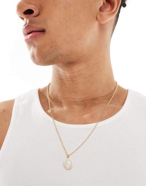 ASOS DESIGN – Goldfarbene Halskette mit ovalem Oversize-Anhänger aus Zier-Perlmutt - view 1
