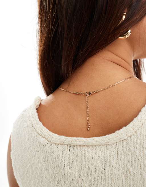 ASOS DESIGN – Goldfarbene Lariat-Halskette mit feinem verschlungenem Design und Knoten, 3 von 4