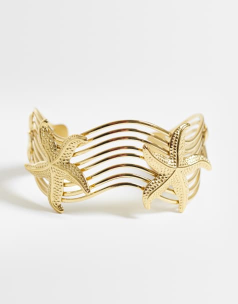 ASOS DESIGN – Goldfarbener Armreif aus wasserfestem Edelstahl mit Seestern-Design - view 1