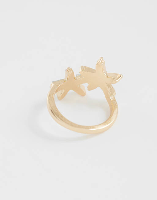 ASOS DESIGN – Goldfarbener Ring mit kleinem, kristallbesetztem Seestern-Design, 2 von 3