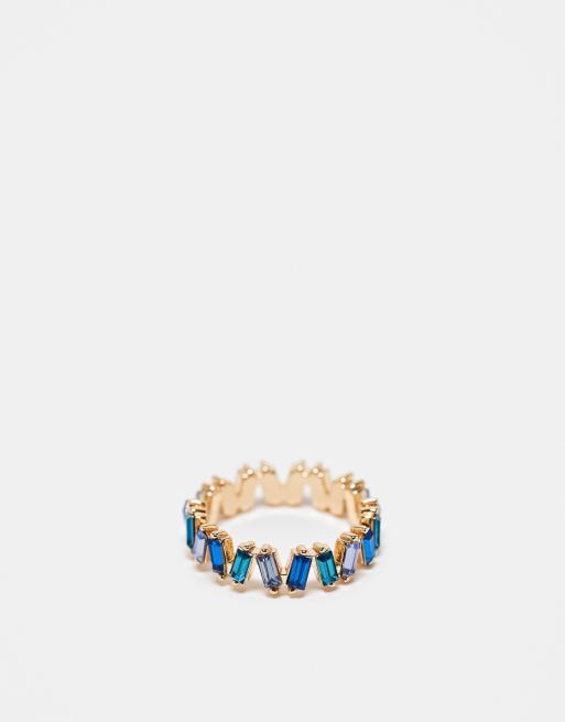ASOS DESIGN – Goldfarbener Ring mit Schmucksteinen in abgestimmten Blautönen im Baguette-Schliff