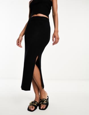 ASOS DESIGN - Gonna al polpaccio in maglia nera a coste in coordinato