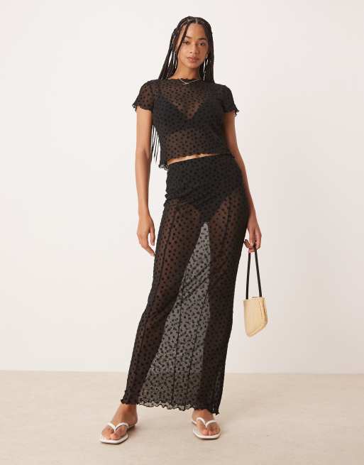 ASOS DESIGN - Gonna lunga in rete trasparente nera floccata a fiori