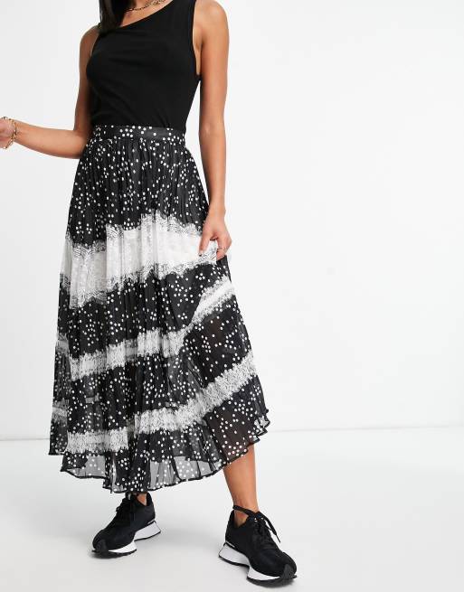 ASOS DESIGN - Gonna midi a pieghe con dettagli in pizzo a pois monocromatici