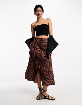 ASOS DESIGN button through midi skirt with split in dark zebra print - ASOS Price Checker