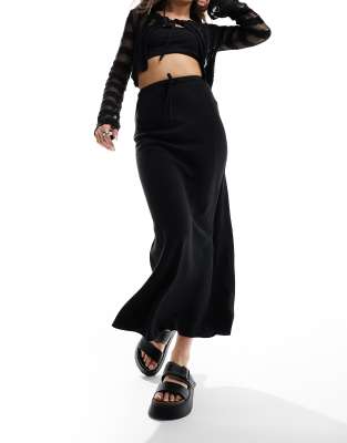 ASOS DESIGN - Gonna midi effetto lino nera allacciata in vita con taglio sbieco