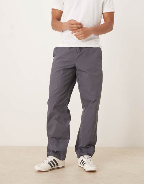 ASOS DESIGN – Grå, baggy byxor med ficka baktill av nylon - view 1