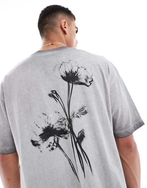 ASOS DESIGN – Grå t-shirt i oversize med blommigt tryck baktill och oljetvätt