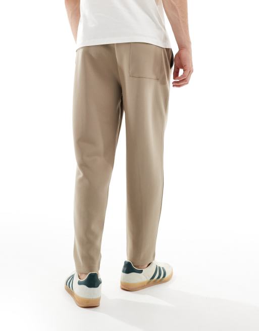ASOS DESIGN – Gråbeige, avsmalnande mjukisbyxor i scubatyg, 2 av 5