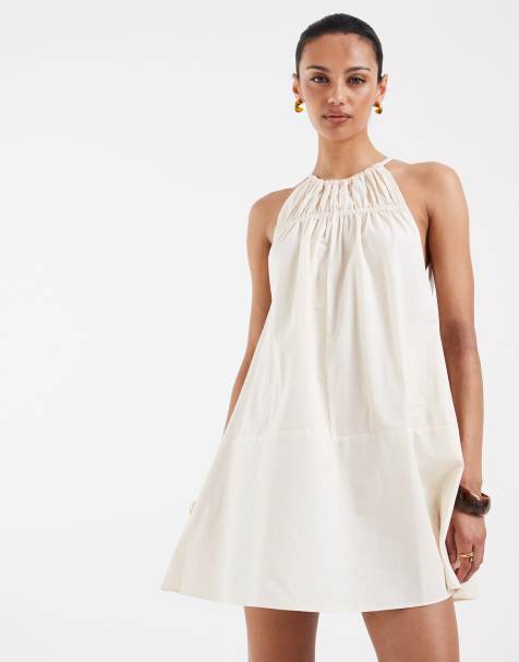 ASOS DESIGN – Gräddvit miniklänning med halterneck och trapetsformad midja - view 1