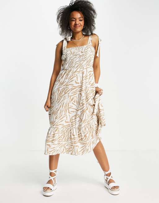 ASOS DESIGN – Gräddvit och brun zebramönstrad midiklänning med knytband och panelsydd nederkant